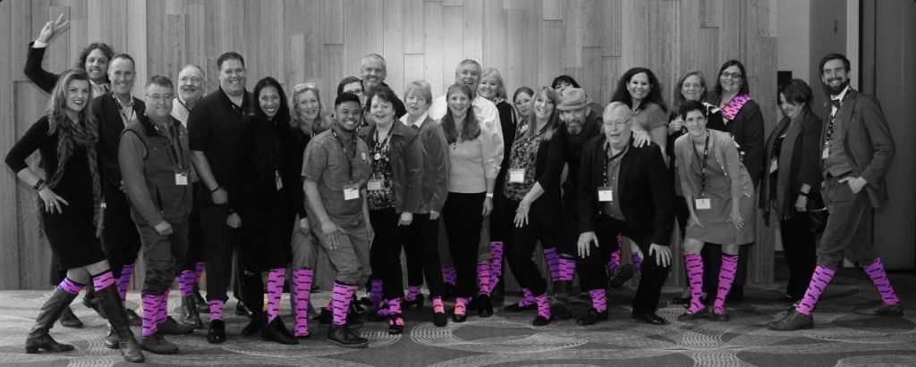 Group of people in pink socks