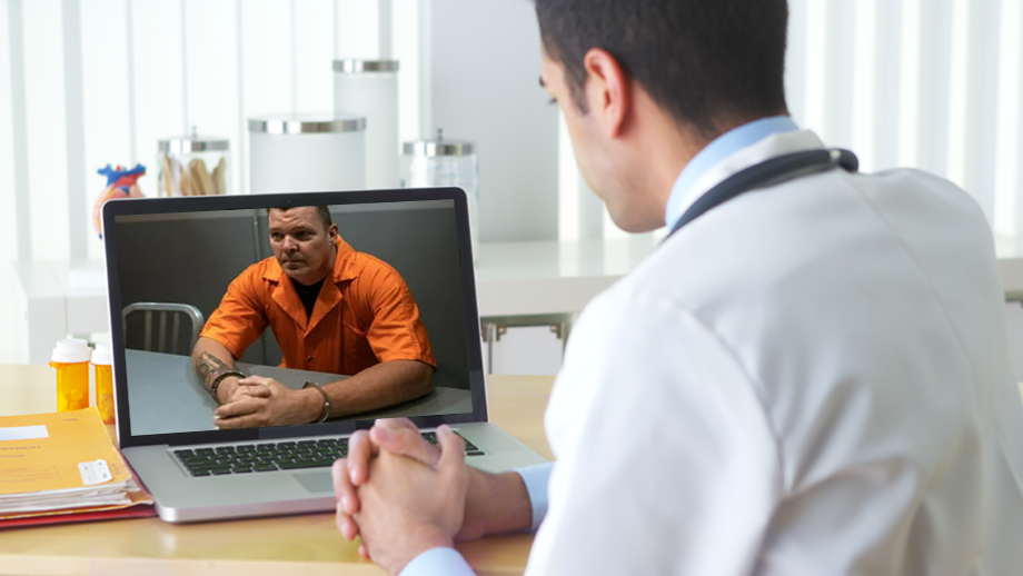 a male prisoner speaking to a doctor through telehealth
